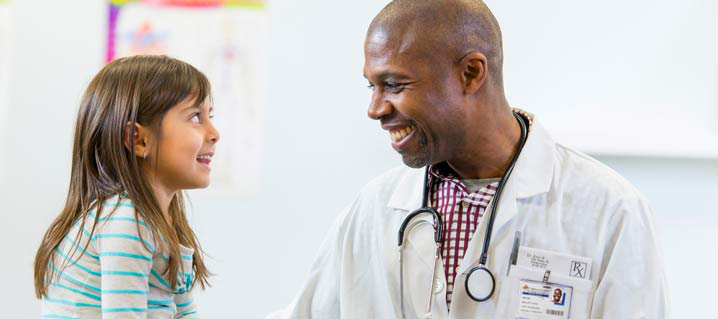 Young Girl with Doctor Stock